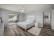 Comfortable main bedroom featuring balcony access and soft decor at 5193 Boyle Ter, Port Charlotte, FL 33981