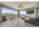 Relaxing covered patio with comfortable seating and water views at 5193 Boyle Ter, Port Charlotte, FL 33981