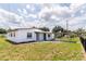 Inviting view of this charming home, featuring a well-kept lawn and a welcoming facade at 5210 S 80Th St, Tampa, FL 33619