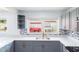 Stylish kitchen with gray cabinets, quartz countertops, and stainless steel sink at 5210 S 80Th St, Tampa, FL 33619
