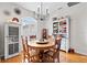Cozy dining room with wooden table, chairs, and rustic decor at 5296 Slater Rd, Spring Hill, FL 34608