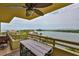Spacious balcony with outdoor dining and relaxing water views at 5701 Mariner St # 701, Tampa, FL 33609