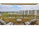 Balcony with seating offering views of the neighborhood at 5701 Mariner St # 701, Tampa, FL 33609
