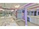 Bright bathroom boasting double sinks, quartz counters, shower, and decorative lighting at 5701 Mariner St # 701, Tampa, FL 33609