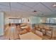 Spacious game room features a pool table, tables, and a bar for entertaining guests at 5701 Mariner St # 701, Tampa, FL 33609