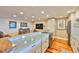 Bright kitchen featuring stainless steel range and view into the adjacent living area at 5701 Mariner St # 701, Tampa, FL 33609
