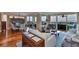 An open floor plan features a living room, dining area, and balcony access with a view of the bay at 5701 Mariner St # 701, Tampa, FL 33609