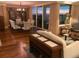 A living room and dining area are visible with views of the city lights from the balcony at 5701 Mariner St # 701, Tampa, FL 33609