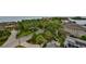 Charming street view showcases lush tropical landscaping surrounding upscale residential homes at 5701 Mariner St # 701, Tampa, FL 33609