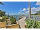Waterfront view from pool area with palms at 5701 Mariner St # 701, Tampa, FL 33609