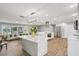 Spacious kitchen with white cabinets, quartz countertops and stainless steel appliances at 6010 Bayou Grande Ne Blvd, St Petersburg, FL 33703