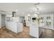 Bright and open kitchen with marble countertops, stainless steel appliances and tile flooring at 6010 Bayou Grande Ne Blvd, St Petersburg, FL 33703