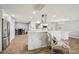 Bright, open kitchen featuring a large island with marble countertops and stainless steel appliances at 6010 Bayou Grande Ne Blvd, St Petersburg, FL 33703
