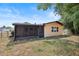 A backyard featuring a patio and lush landscaping at 6109 16Th St, Zephyrhills, FL 33542