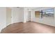 This bedroom has wood-look flooring, a window providing natural light, and a closet with ample storage at 6109 16Th St, Zephyrhills, FL 33542