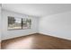 Bright bedroom features a large window providing natural light and views of the neighborhood street at 6109 16Th St, Zephyrhills, FL 33542