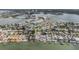 Aerial view of coastal real estate featuring stunning waterfront views and community amenities at 7092 S Shore S Dr, St Petersburg, FL 33707