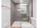 Bathroom featuring sleek glass shower, modern tiles, and contemporary fixtures at 7092 S Shore S Dr, St Petersburg, FL 33707