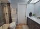 Modern bathroom with glass shower, stylish vanity, and contemporary fixtures at 7092 S Shore S Dr, St Petersburg, FL 33707
