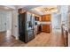 Well-designed kitchen boasting stainless steel appliances and wood cabinets at 7092 S Shore S Dr, St Petersburg, FL 33707