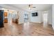 Open-concept living room flowing into the kitchen with access to the pool at 7092 S Shore S Dr, St Petersburg, FL 33707