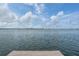 Beautiful water view from the home's private dock, with scenic views of the surrounding community at 7092 S Shore S Dr, St Petersburg, FL 33707