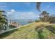 Beautiful backyard landscaping and waterfront access with private dock and ample space for recreation at 7092 S Shore S Dr, St Petersburg, FL 33707