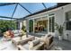 Lanai featuring wood furniture and outdoor seating at 7253 Cleopatra Dr, Land O Lakes, FL 34637
