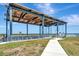 This covered boat lift on a canal is ready for boating season at 915 Tidewater Shores Loop, Bradenton, FL 34208