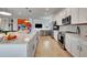 Stylish kitchen features stainless steel appliances, a large center island, and an open layout at 915 Tidewater Shores Loop, Bradenton, FL 34208