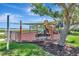 Community playground featuring shade cover, swings, slide, and climbing structure with views of bay at 915 Tidewater Shores Loop, Bradenton, FL 34208
