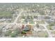 Aerial view of a single-Gathering home with a fenced backyard in a residential neighborhood at 10101 Langan St, Spring Hill, FL 34608