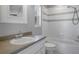 Full bathroom featuring a shower-tub combo and a vanity with white cabinets at 10101 Langan St, Spring Hill, FL 34608