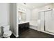 Bathroom with double vanity, tub/shower, and tile floors at 10628 Massimo Dr, Wimauma, FL 33598
