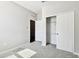This bedroom has carpet and a closet, and is brightly lit at 10628 Massimo Dr, Wimauma, FL 33598