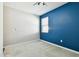 Bright bedroom with a ceiling fan, two-tone paint, and carpet flooring at 10628 Massimo Dr, Wimauma, FL 33598
