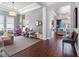 Bright and spacious living room featuring hardwood floors, and an open concept design at 1104 Isobel Reserve Ln, Tampa, FL 33613