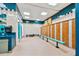 View of locker room with lockers and changing stalls at 11162 Kapok Grand Cir, Madeira Beach, FL 33708