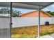 View of the fenced backyard with a covered patio at 11762 82Nd Ter, Seminole, FL 33772