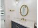 Modern bathroom with stylish vanity, gold accents, and elegant fixtures at 11762 82Nd Ter, Seminole, FL 33772