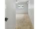 Neutral-toned bedroom featuring carpeting and a window at 11762 82Nd Ter, Seminole, FL 33772
