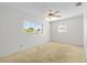 Bright bedroom with ample natural light and ceiling fan at 11762 82Nd Ter, Seminole, FL 33772