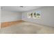 Spacious living room featuring plush carpeting and bright natural light from the window at 11762 82Nd Ter, Seminole, FL 33772