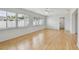 Bright living room featuring hardwood floors and windows at 11762 82Nd Ter, Seminole, FL 33772