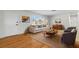 Cozy living room with hardwood floors, neutral tones, and comfortable seating at 11762 82Nd Ter, Seminole, FL 33772