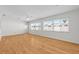 Large living room boasts hardwood floors, bright lighting, and ample space at 11762 82Nd Ter, Seminole, FL 33772