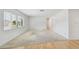 Bright and airy living room with hardwood floors, large window, and ample natural light at 11762 82Nd Ter, Seminole, FL 33772