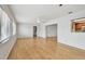 Bright living room features hardwood floors and an open view to adjacent rooms at 11762 82Nd Ter, Seminole, FL 33772