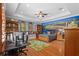 Spacious bedroom with golf themed decor, wood floors, and a tray ceiling at 11817 Glen Wessex Ct, Tampa, FL 33626