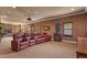 Large home theater and game room combo is ready for relaxation and entertainment at 11817 Glen Wessex Ct, Tampa, FL 33626